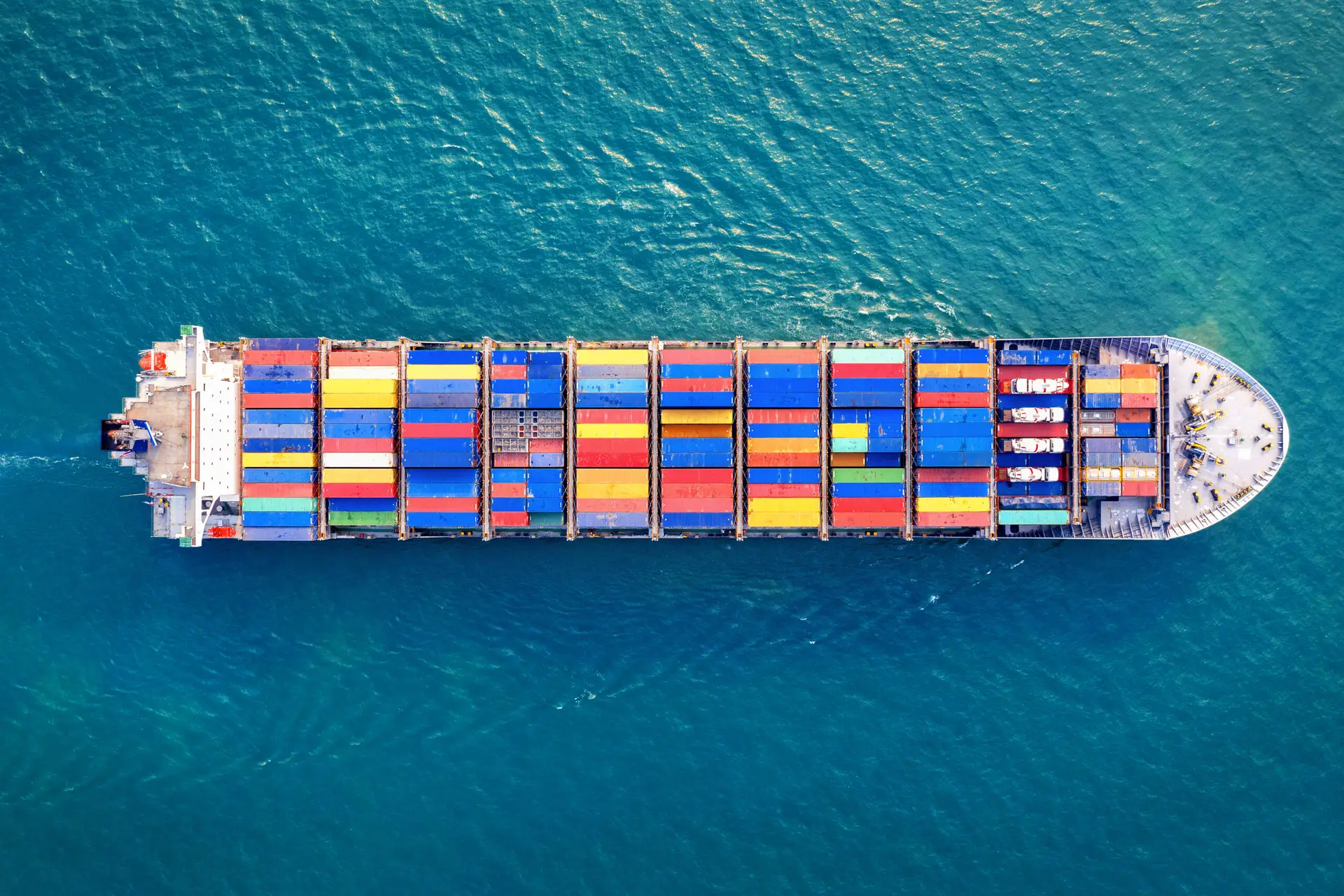 aerial view of container cargo ship in sea.